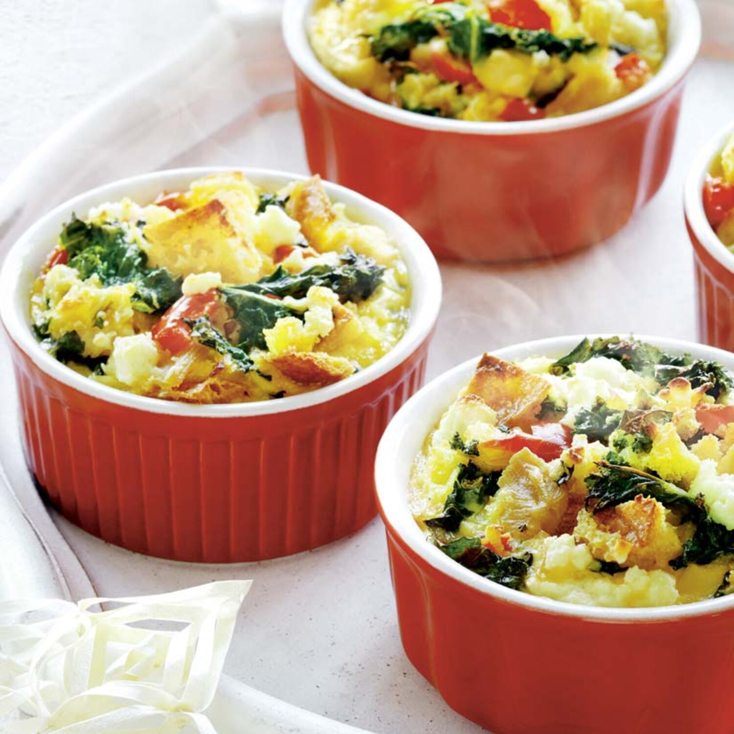 Recette de mini-strata à la dinde, au kale et au chèvre | Coup de Pouce