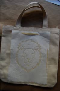 Iron the stencil to the tote bag (shiny side down!)