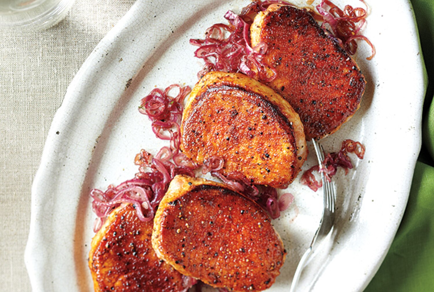 Spice-Rubbed Pork Chops With Sweet and Sour Onion | Canadian Living