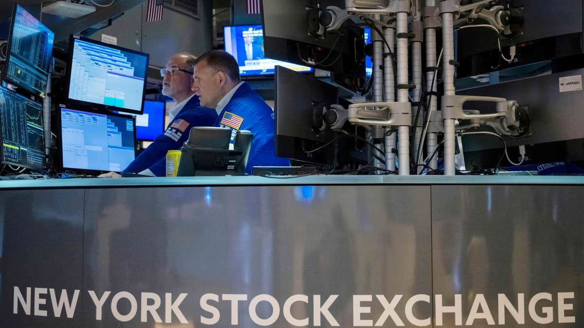 Wall Street termine en ordre dispersé, record pour le Dow Jones