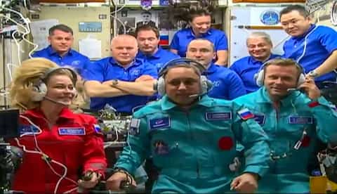 A Russian team aboard the International Space Station to sign the first film in orbit