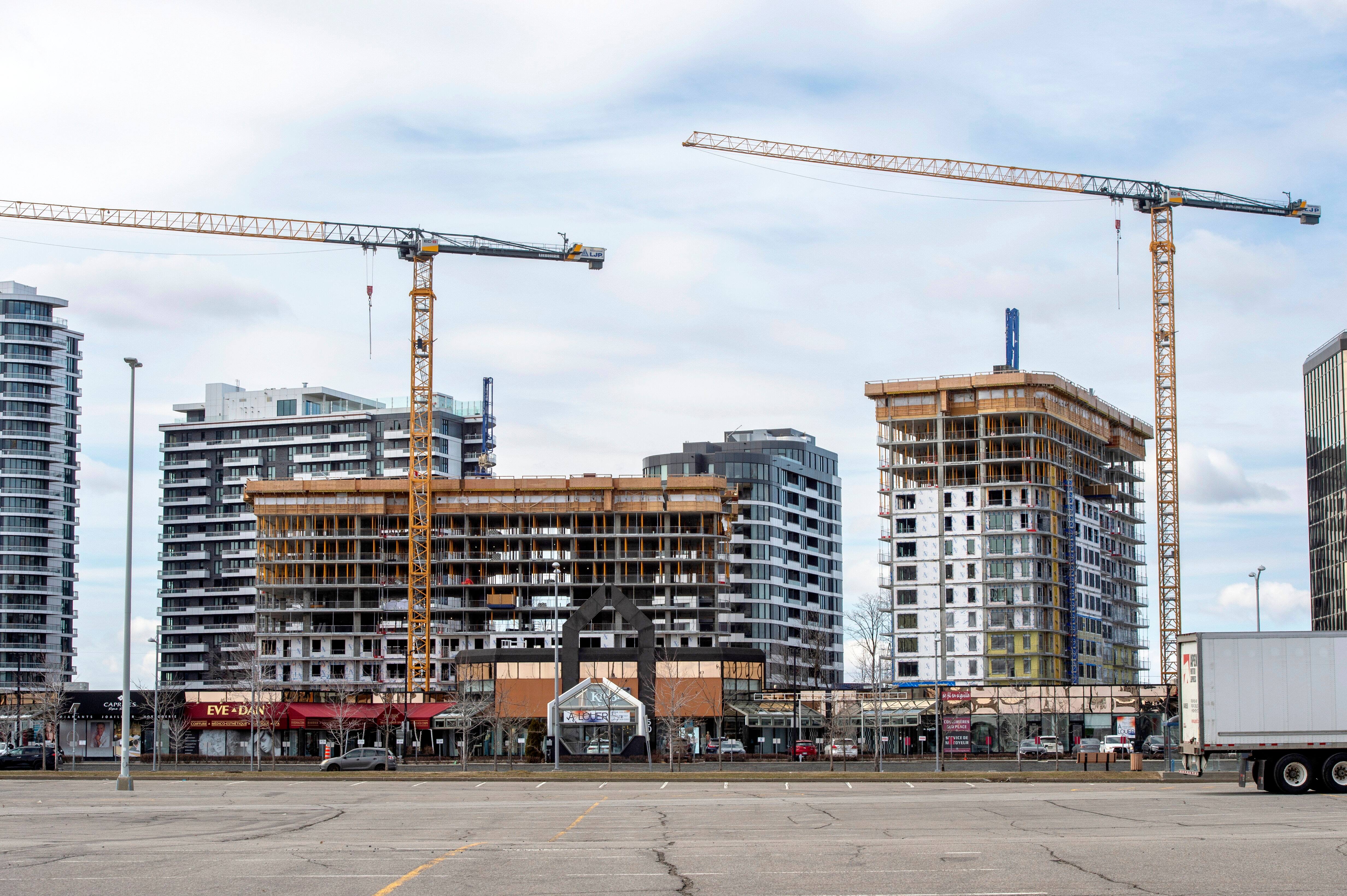 Residential towers under construction west of Carrefour Laval.