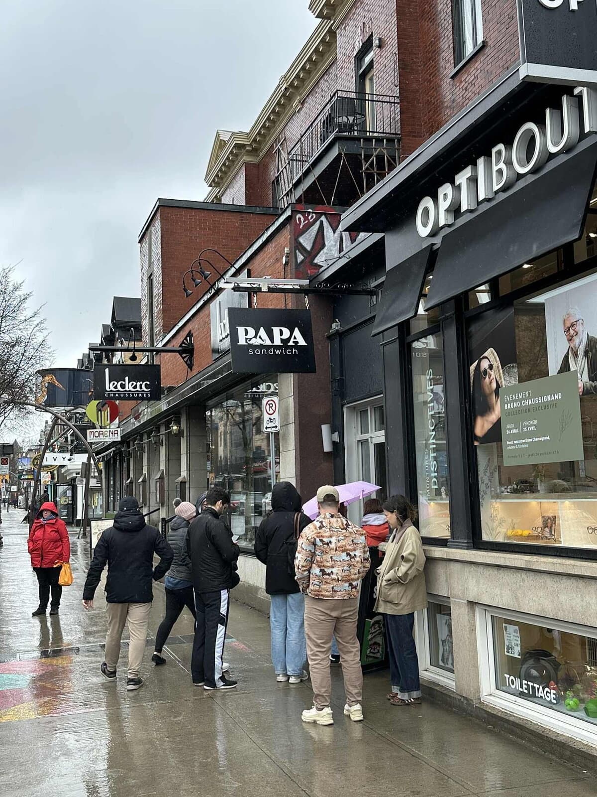 Customers line up outside Papa Sandwich
