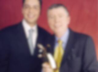 Son fils heureux du retour de Symphorien