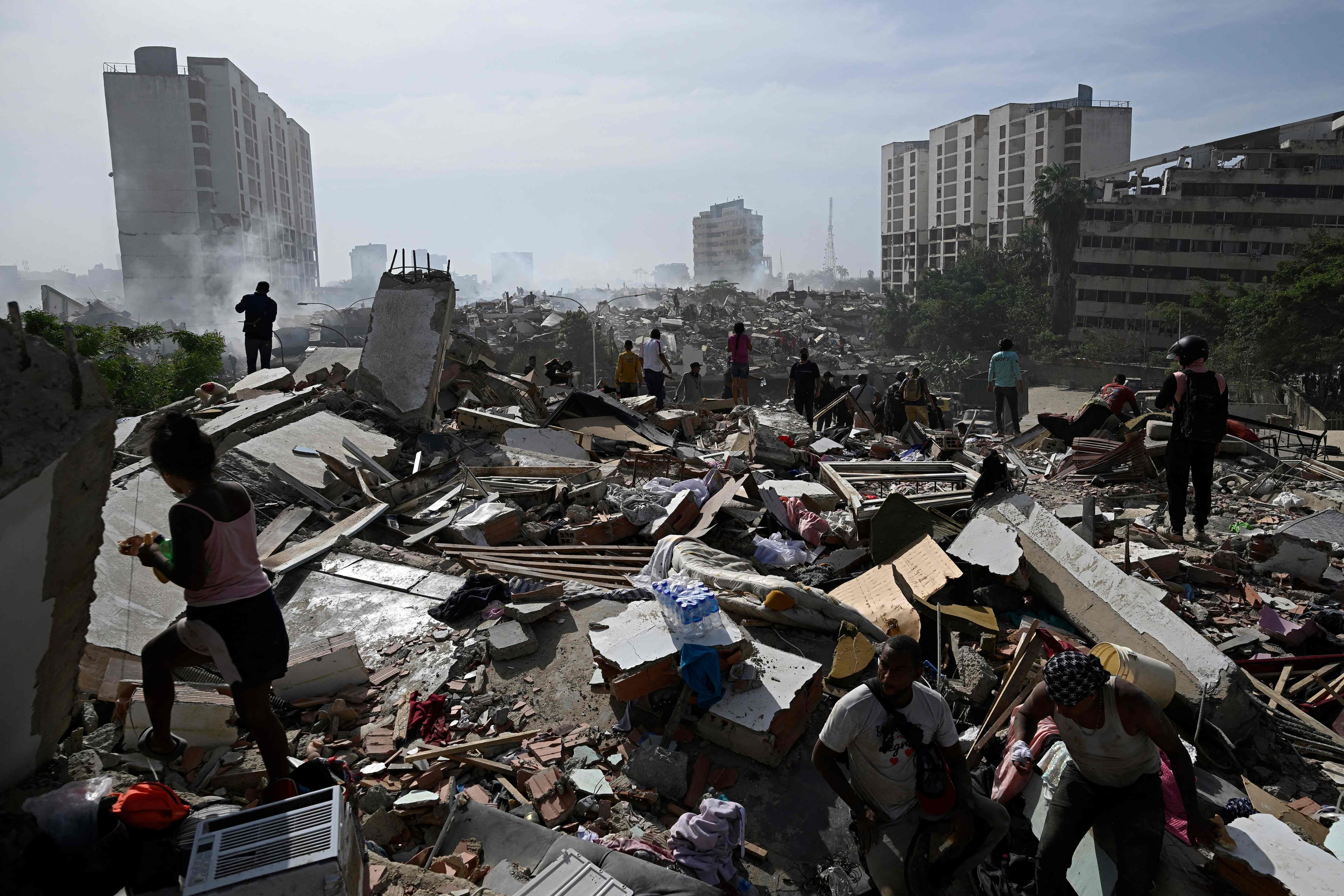 Venezuelans search for their loved ones in the rubble.