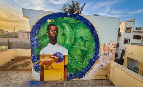 A mural in tribute to Karim Ouellet was painted in Dakar, Senegal, by Quebec artist Monk.E, on January 20, 2022.