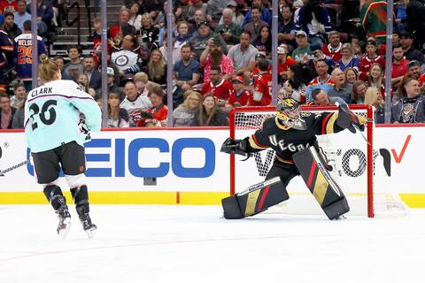 Goaltender Logan Thompson tries to make a save on guest Emily Clark during the All-Star Game skills competition last Friday.