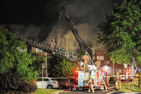 Despite the night, a large black cloud of smoke was visible nearby.