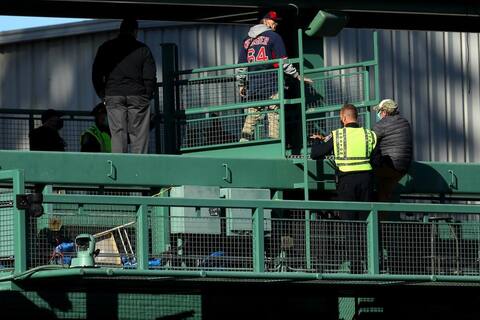 A supporter comes to Fenway Park