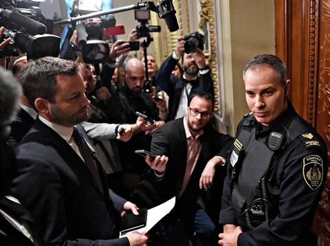 Mr. St-Pierre Plamondon had his way blocked by a special constable under the supervision of journalists.