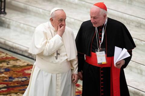 Pope Francis and Cardinal Mark Olette at the Vatican last February.