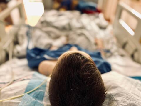 Two days following his delicate neurosurgical operation, little Samuel Méthot was doing rehabilitation exercises with the neurosurgeon who operated on him, Dr. Roy Dudley.