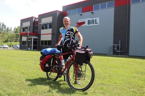 Jan Traversi, co-owner of Structure BRL in Drummondville, re-rided his bike on July 16, 2021, after a layover in his hometown. We see Mr. Traversi in front of his factory on Bergeron Street, in Drummondville, on July 16, 2021.