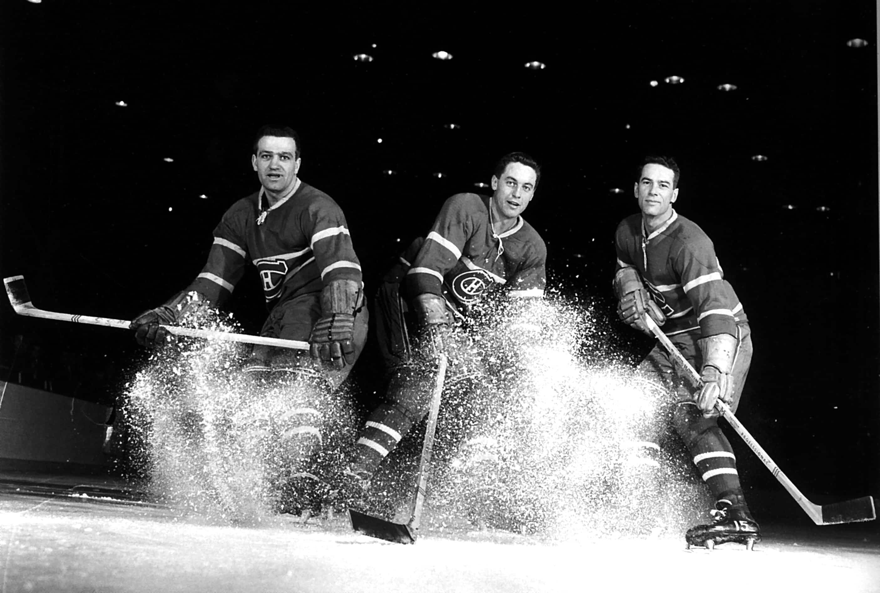 Bert Olmstead (à droite sur la photo) a remporté trois coupes Stanley en évoluant sur le même trio avec Bernard Geoffrion et Jean Béliveau.