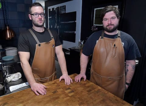 A last-minute cancellation forced Verre Pickle' restaurant co-owner Jerome Gilpin (right) and his cook Philip Gilpin to close the establishment without serving customers on Friday.