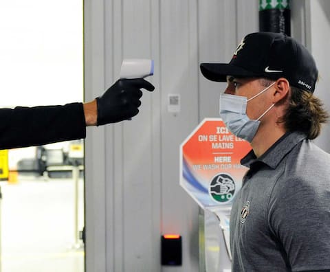 Here we take Pierrick Dubé's temperature before a morning training session for the team.