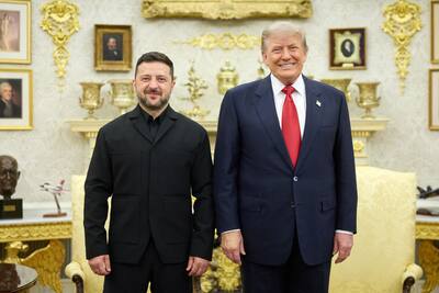 Ukrainian President Volodymyr Zelensky (left) and U.S. President Donald Trump pose for a photo during their meeting in Washington, DC, amid the Russian invasion of Ukraine.