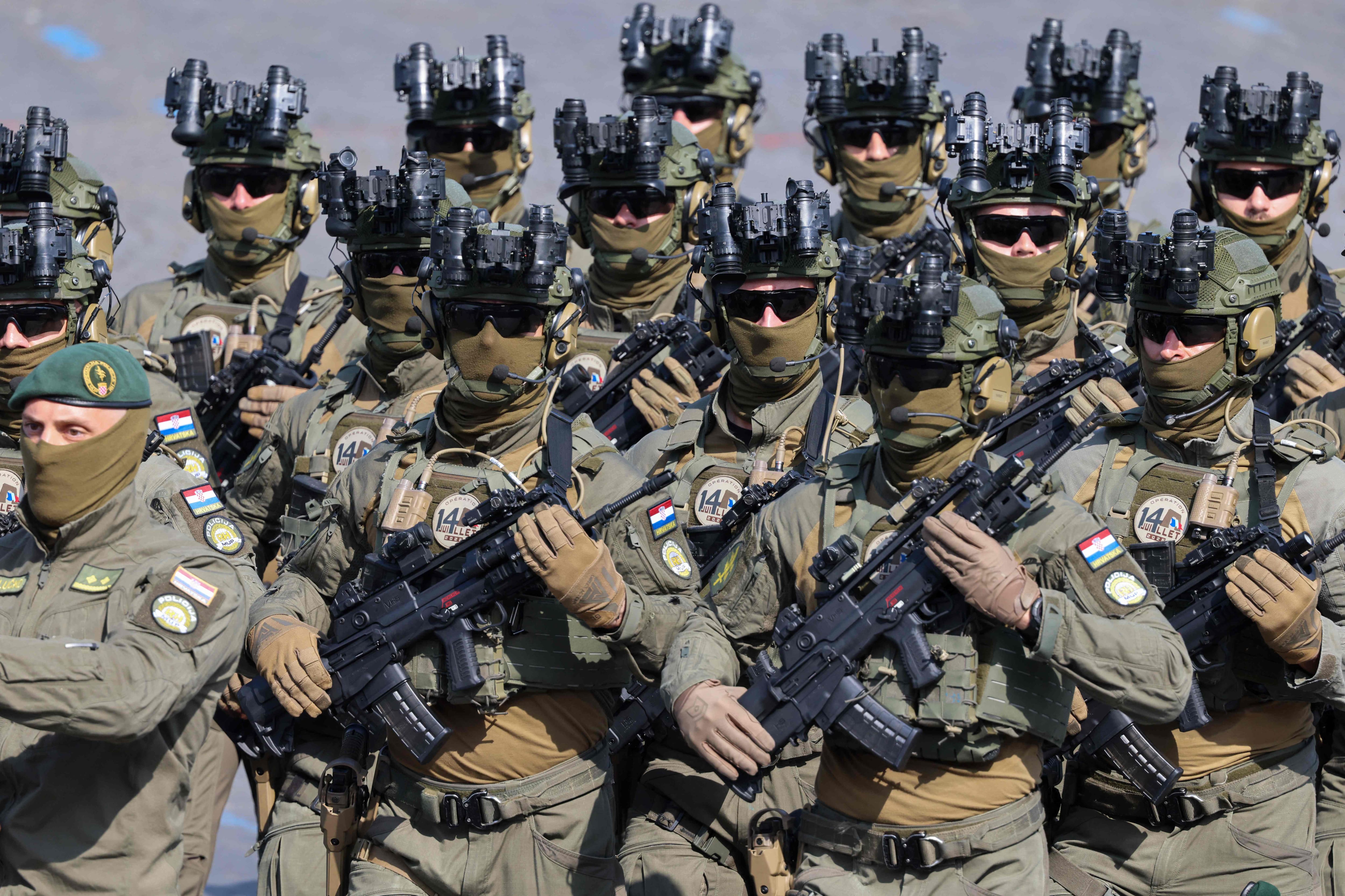 Croatian troops from the Coalition of Volunteers of Invited Foreign Nations take part in the annual Bastille Day military parade on Avenue des Champs-&Eacute;lys&eacute;es in Paris, July 14, 2026.