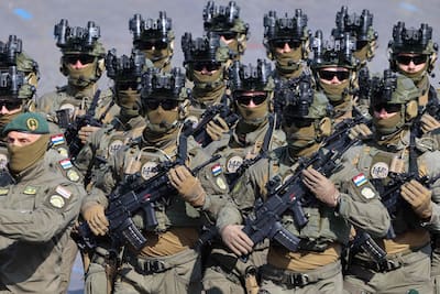 Croatian troops from the Coalition of Volunteers of Invited Foreign Nations take part in the annual Bastille Day military parade on Avenue des Champs-Élysées in Paris, July 14, 2026.