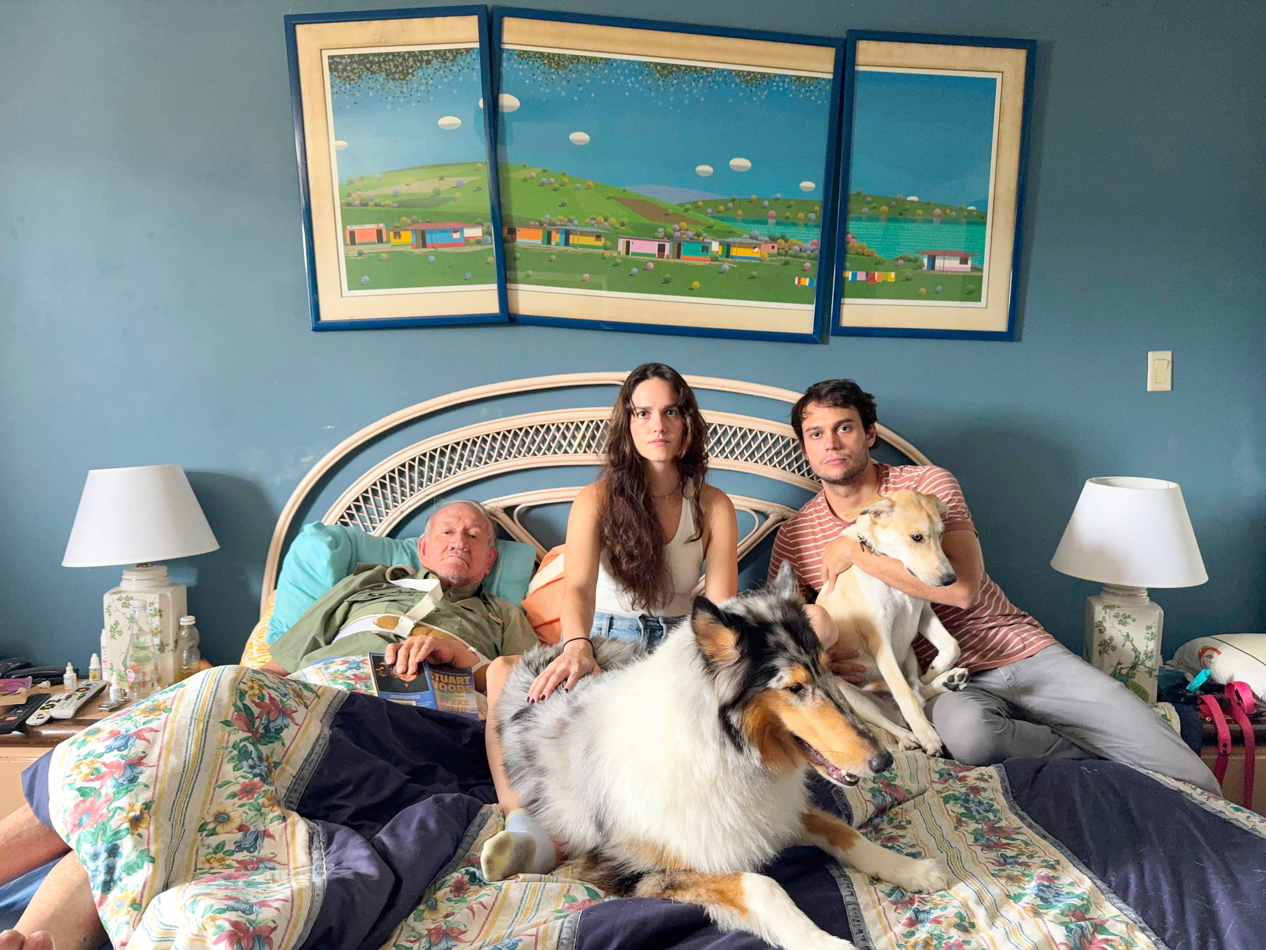 Carlos Burgues, his father, Ramon Burgues (left), his sister, B&aacute;rbara Burgues (center), and their two dogs, Mafalda and Valentina, escaped the worst in the double tremor that disrupted the country.