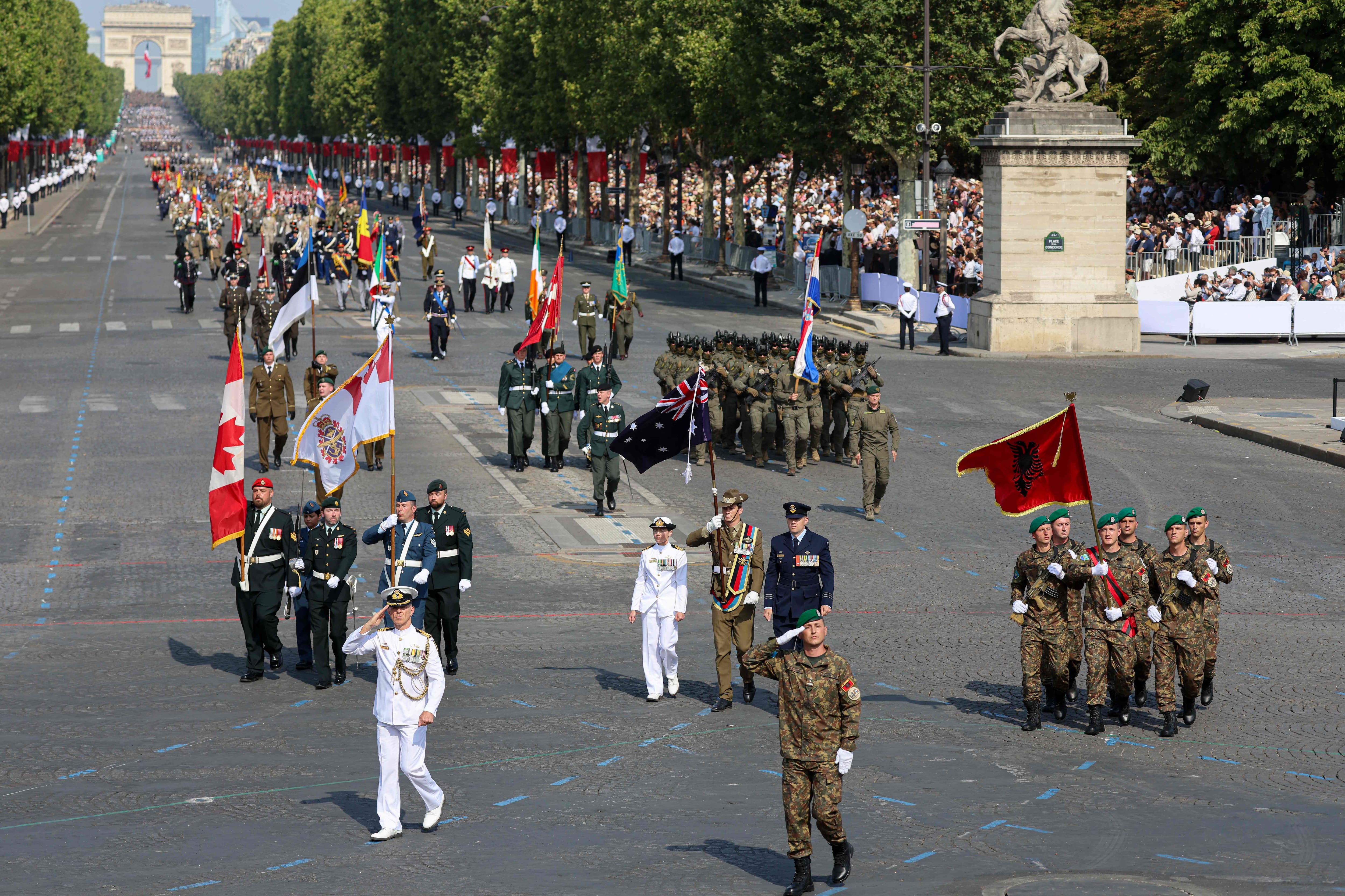 Troops from the Coalition of Volunteers from invited foreign nations participate in the annual Bastille Day military parade on Avenue des Champs-&Eacute;lys&eacute;es in Paris, July 14, 2026.