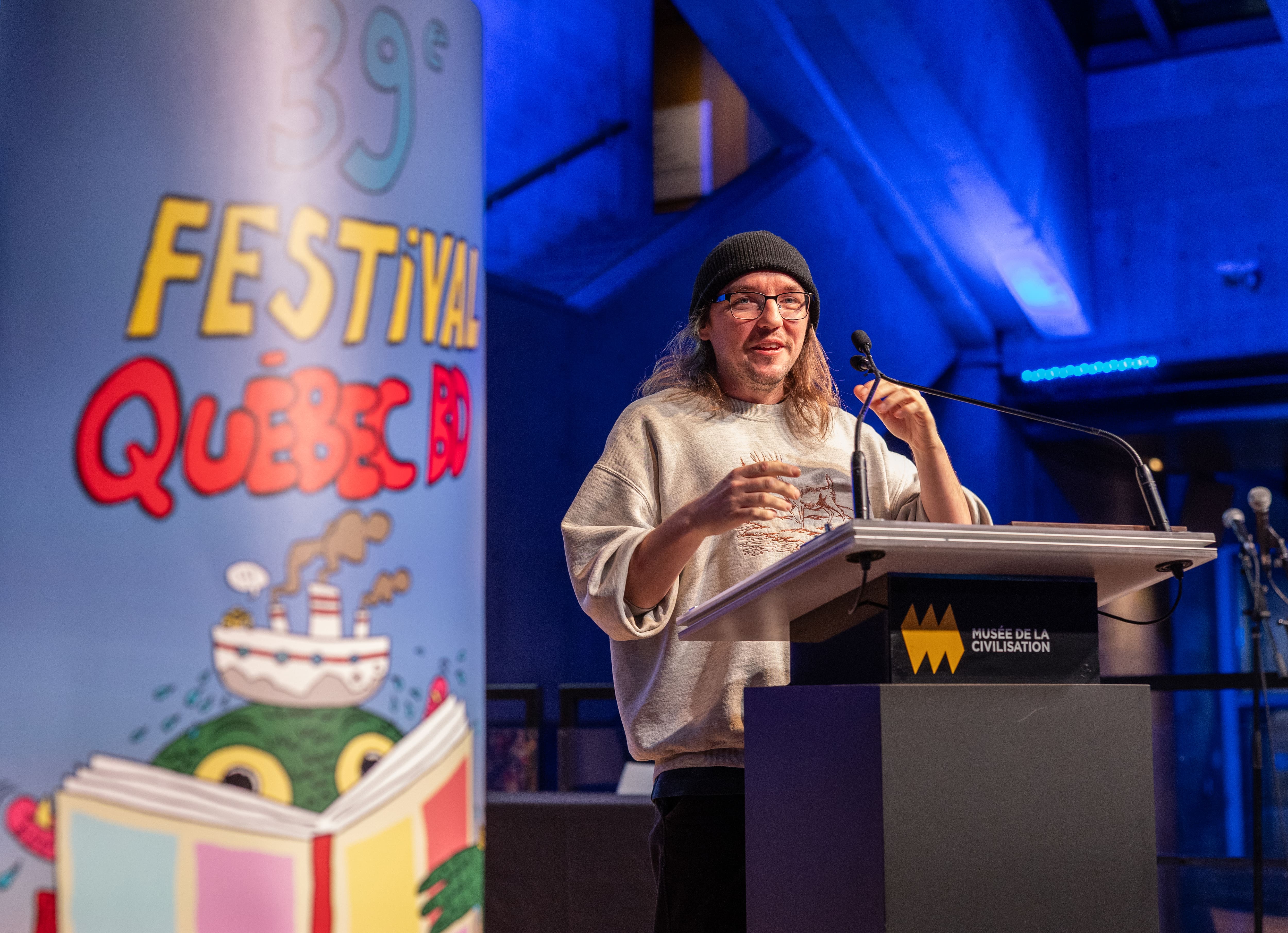 «Ça confirme que j’ai ma place»: Alex A., le créateur de L’Agent Jean, honoré au Festival Québec BD