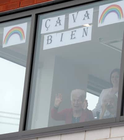 On the left, a customer stocking up on toilet paper at Costco on March 13, 2020. On the right, seniors received wishes for their 90th birthday through their home window on March 23, 2020... confinement required.