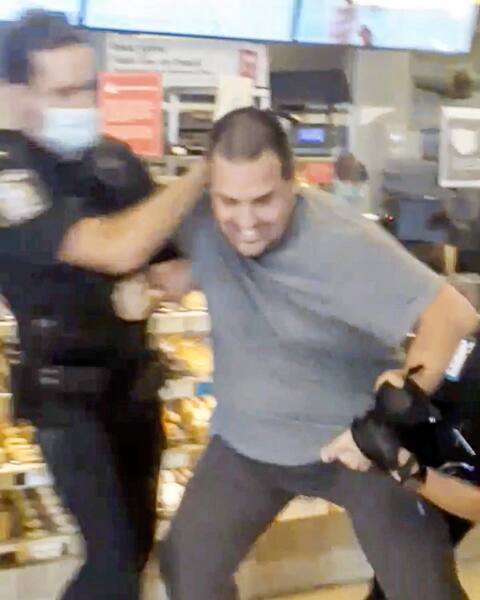 Marc-André Jean Legros during his arrest in July in a Tim Hortons in Montreal.