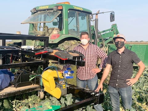 From left to right, Éric Lapalme, president of Lapalme Conception Mécanique, and Cédrick Boulais-Richard, engineer in charge of the Sami robot which could lend a hand to farmers.