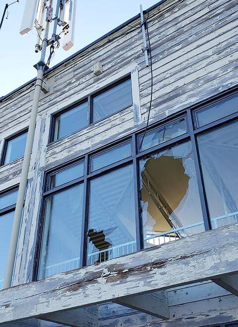 The windows were cracked by vandals.