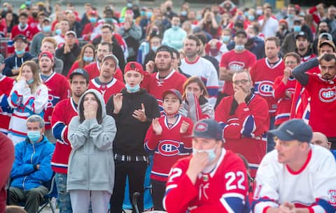 There are a lot of faces outside the Olympic Stadium on Friday night, where Canadian fans can follow the game.