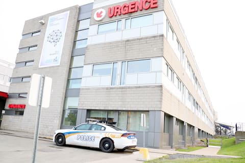 CHUL de Quebec carrying baby.