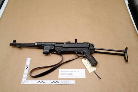 The submachine gun escaped from officers during a first search of Raymond Tattoo in January. It was captured in May.