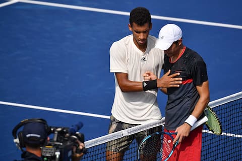 Felix Agar-Aliassim (left) congratulates Evgeny Danskoy after Monday's victory in New York.