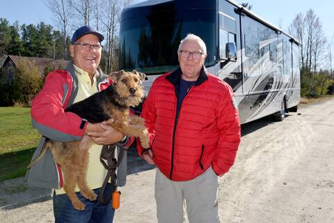 Robert Leriche and Jean-Claude Ledeck can't wait to move to Florida with their dog Caesar.