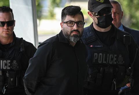 Mohamed Lilo was taken to Saint-Hubert Airport by Ontario Provincial Police officers.