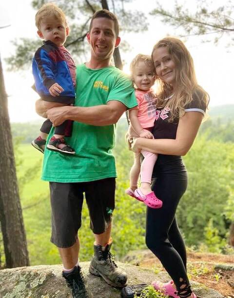 Jason Hobson and Isabel Dupuis are with their children Bo, 2 and Megan, 3, who are unable to go to daycare due to the CPE strike.