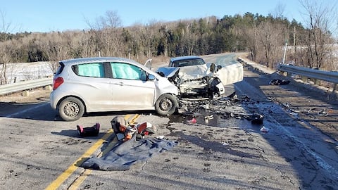 The family was sitting in the small car in the front. Rescue workers pulled out at least one car seat, which was visible on the ground, after a fatal impact.
