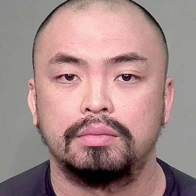 Robert Luu durante su arresto por la policía de Montreal en febrero de 2022