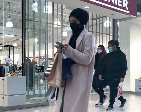 Customers shopped with the mask
