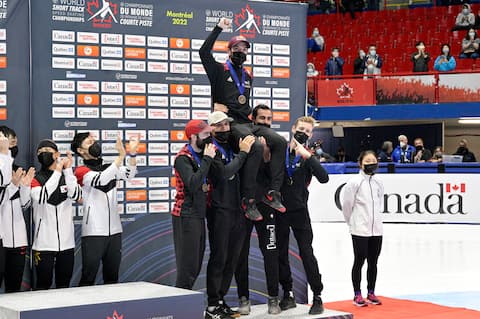 After getting off the podium, Charles Hamlin was carried in victory by his teammates.