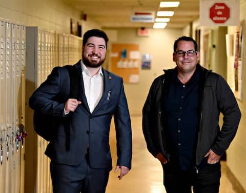 Etienne's parent and his former teacher, Carl Baribeau.