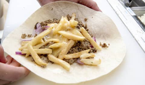 French tacos are mostly fries and cheese sauce.