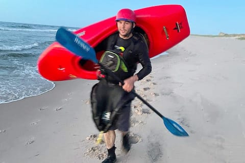Samuel Doyan, junior electrical engineer, kayaking near Gros-Isle at the same location.