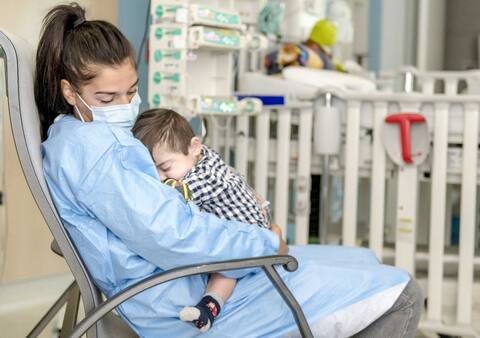 Before long he was fast asleep in his mother's arms.