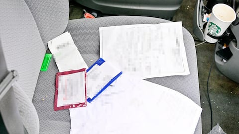 Several items including identity documents were found in the abandoned car.