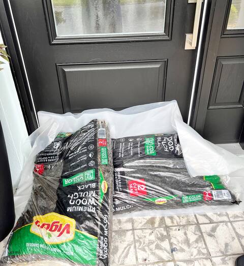 Quebec residents place sandbags in front of their doors to prevent water from entering their homes in the event of a flood.