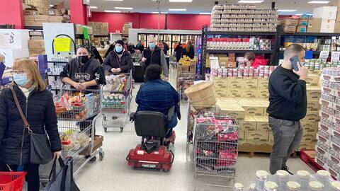 Customers circulate in a grocery store in Saint-Jean-sur-Richelieu.
