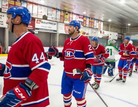 Stéphane Richer, Pierre Dagenais, Gilbert Delorme and Stéphane Quintal during the traditional handshake at the end of the match.