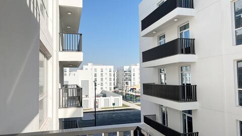The exterior view of the condo where the two guys live in a brand new neighborhood.